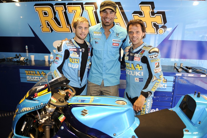 Alvaro_Bautista_Rich_and_Loris_Capirossi_MotoGP_Catalunya.jpg